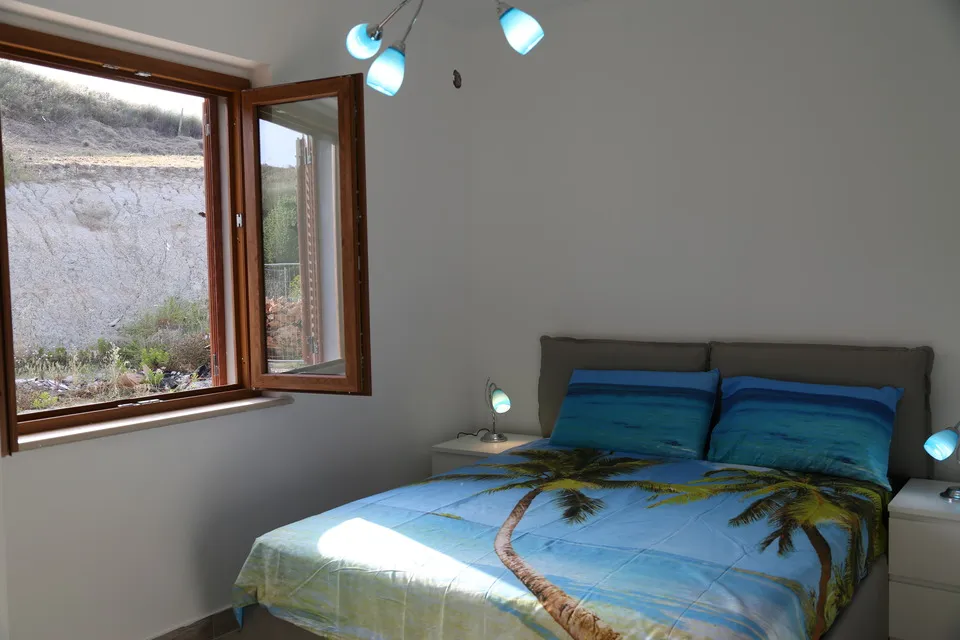 Master bedroom with a double bed