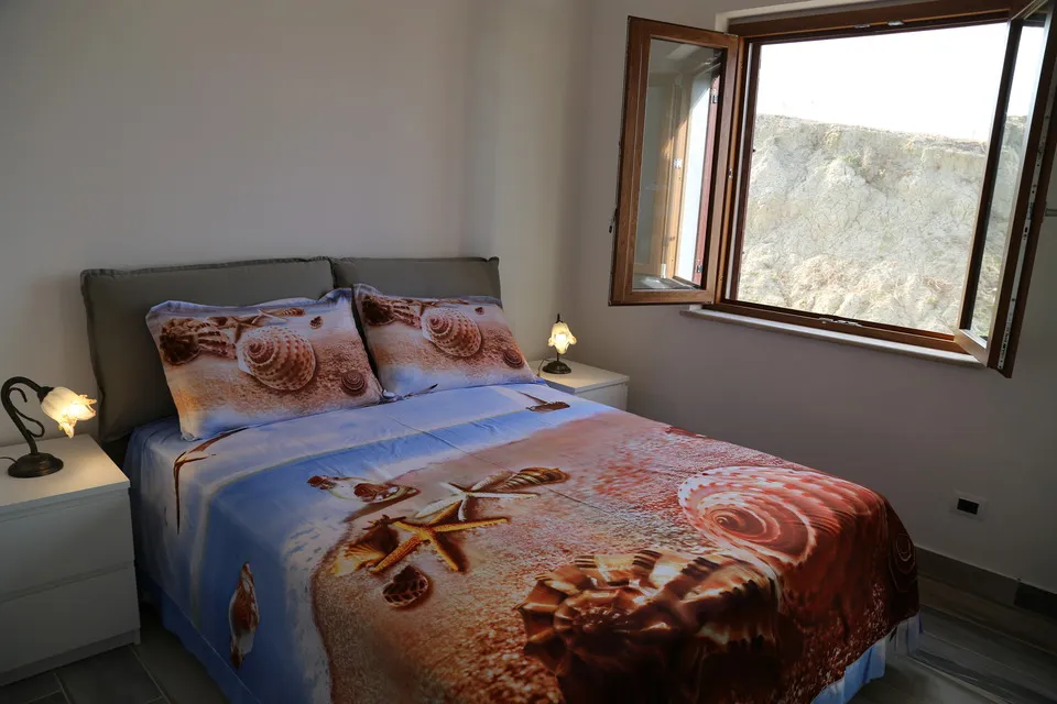 Second bedroom with the window open