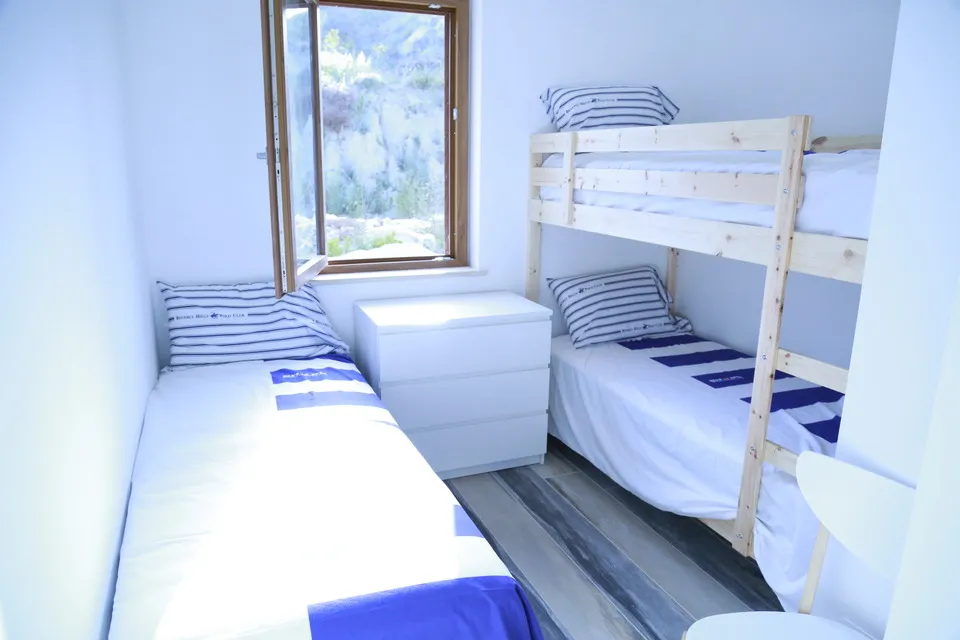 Bunk bed room with the window open