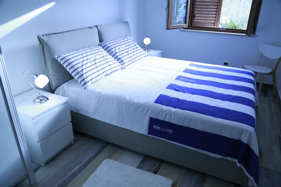 Sunlit master bedroom double bed